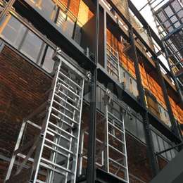 Ladders and gantries for maintenance behind architectural sun protection Ladder and gantry for maintenance behind architectural sun protection.